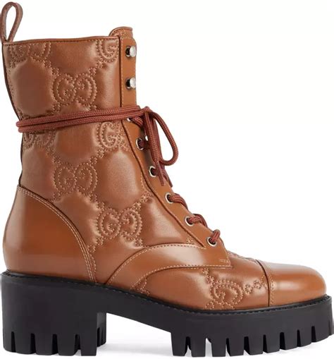 gucci logo quilted leather combat boot|Gucci knee boots.